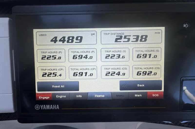 Slide: The Image of Display screen showing fuel usage and trip data for 2019 Grady-White Canyon 456 boat. - 29