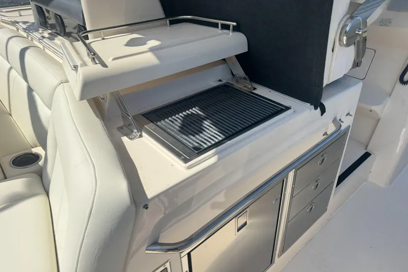 Slide: The Image of Outdoor grill and storage on 2019 Grady-White Canyon 456 boat. - 20