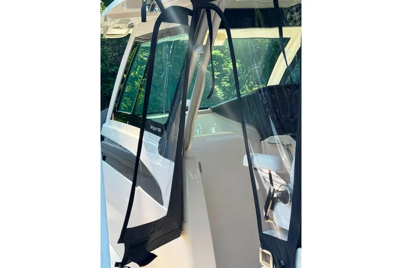 Slide: The Image of 2019 Grady-White Canyon 456 boat interior with clear protective covers. - 54