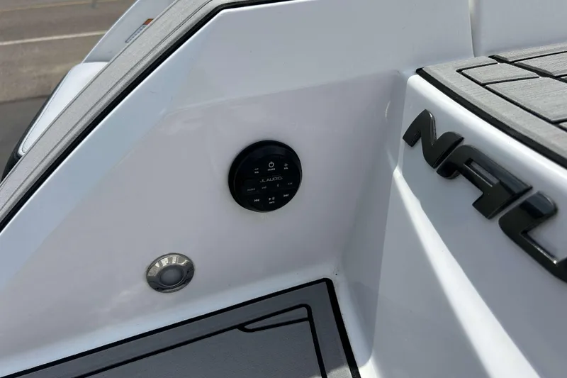 Slide: The Image of 2021 Nautique Super Air Nautique GS24 boat detail with JL Audio control panel. - 6