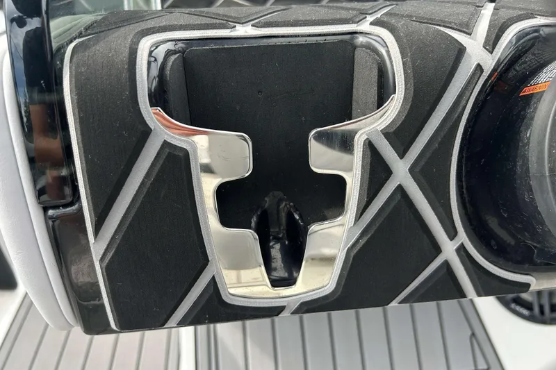 Slide: The Image of Close-up of 2021 Nautique Super Air Nautique GS24 boat detail with sleek design elements. - 23