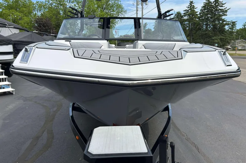 Slide: The Image of 2021 Nautique Super Air Nautique GS24 boat on trailer, front view. - 31