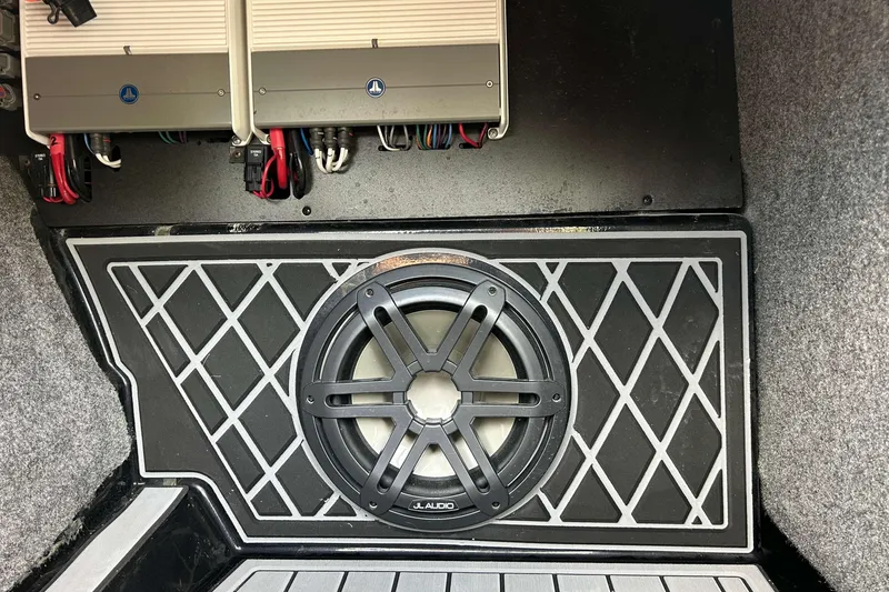 Slide: The Image of 2021 Nautique Super Air Nautique GS24 audio system with JL Audio subwoofer and amplifiers. - 16