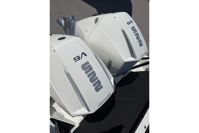 Slide: The Image of Twin Navan S30 outboard engines, 2026 model, featuring sleek white design and V6 branding. - 33
