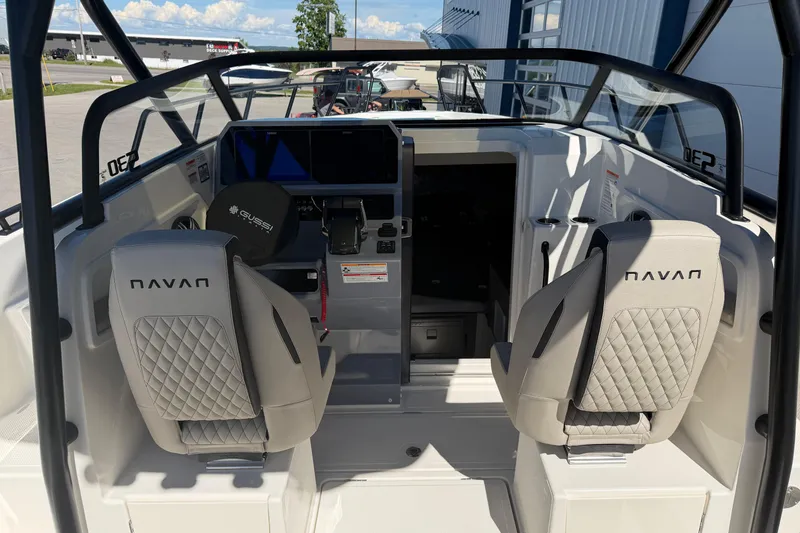 Slide: The Image of Interior view of 2026 Navan S30 boat with modern seating and dashboard. - 15