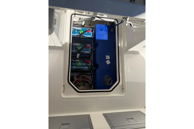Slide: The Image of Battery compartment of 2026 Navan S30 boat, showcasing ReLion batteries and wiring. - 22