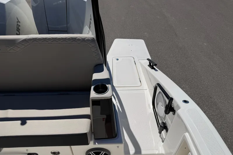 Slide: The Image of Rear view of 2026 Navan S30 boat with seating and storage compartments. - 17