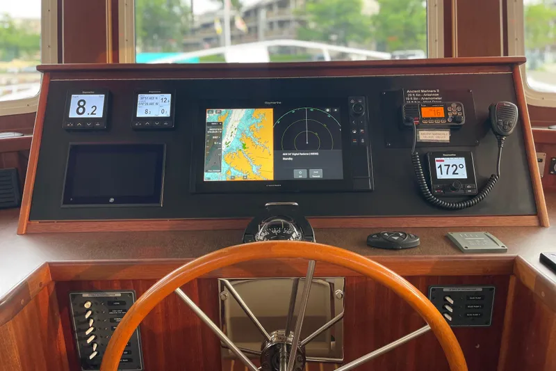 Slide: The Image of Helm of 2006 American Tug 41 with navigation and communication equipment. - 5