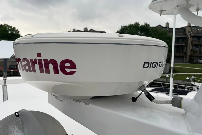 Slide: The Image of Radar equipment on a 2006 American Tug 41 boat, featuring marine technology. - 25