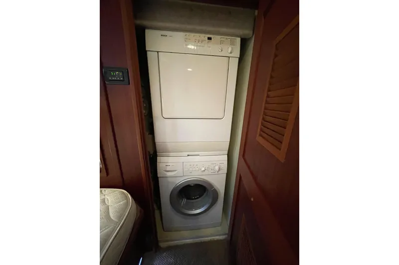 Slide: The Image of Stacked washer and dryer in 2006 American Tug 41 boat interior. - 22