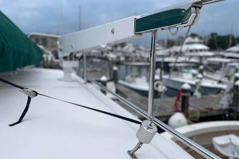 Slide: The Image of Close-up of 2006 American Tug 41 deck railing at a marina. - 29