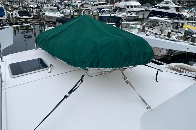 Slide: The Image of Covered equipment on 2006 American Tug 41 boat deck at marina. - 33