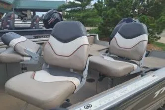 Slide: The Image of 2006 Tracker Pro Guide V-16 SC boat seats, featuring comfortable, modern design. - 7