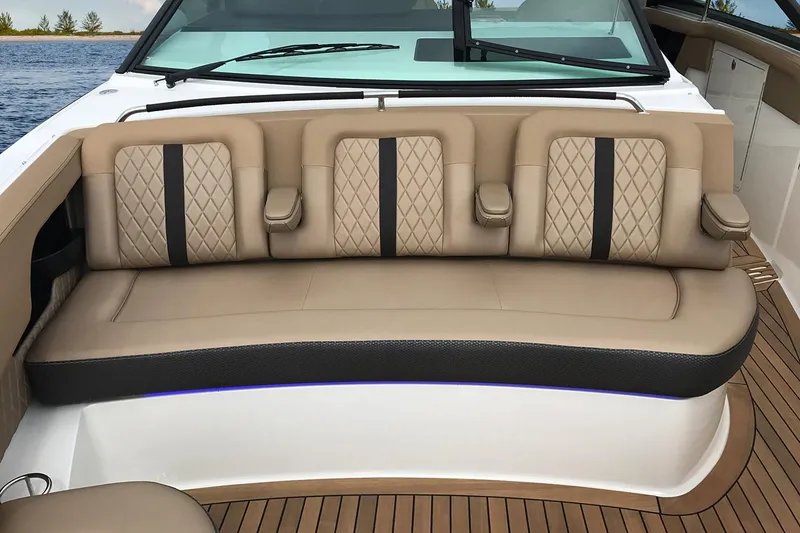 Slide: The Image of Manufacturer Provided Image: 2018 Sea Ray SLX 400 boat with luxurious tan seating and teak flooring. - 10
