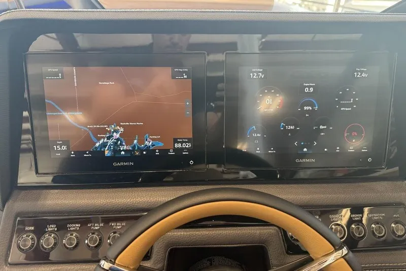 Slide: The Image of Dashboard of a 2026 Cobalt R4 with dual Garmin displays showing navigation and system data. - 14