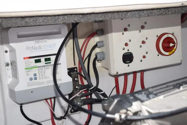 Slide: The Image of outboard port motor, smart charger, shut off switch, circuit breakers - 55