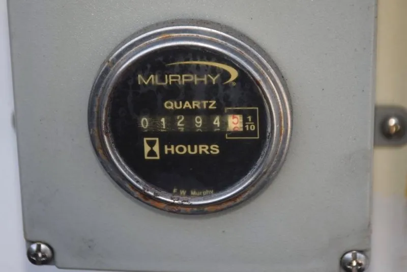 Slide: The Image of portside hour meter reading 1294 - 57