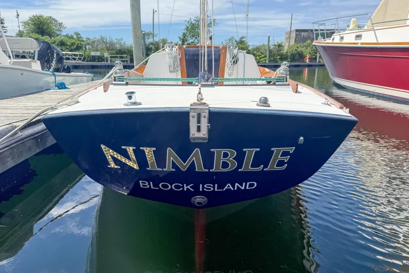 Slide: The Image of Alerion Express 28 sailboat, 1997 model, named "Nimble" docked at Block Island marina. - 6