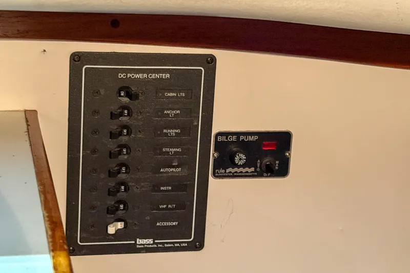 Slide: The Image of Control panel of a 1997 Alerion Express 28 sailboat with DC power center and bilge pump. - 25