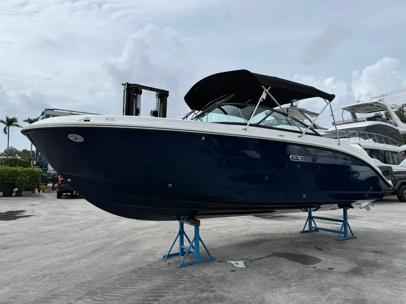 Slide: The Image of Sea Ray SDX 250 Outboard 2026 on stands outdoors. - 4