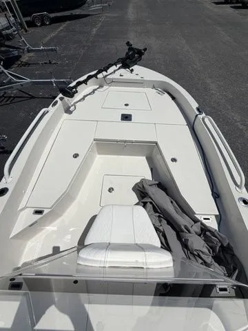 Slide: The Image of The image shows the deck of a 2025 Ranger 2360 Bay boat with seating and cover. - 4