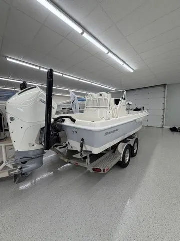 Slide: The Image of Ranger 2360 Bay 2025 in a showroom on a trailer. - 30