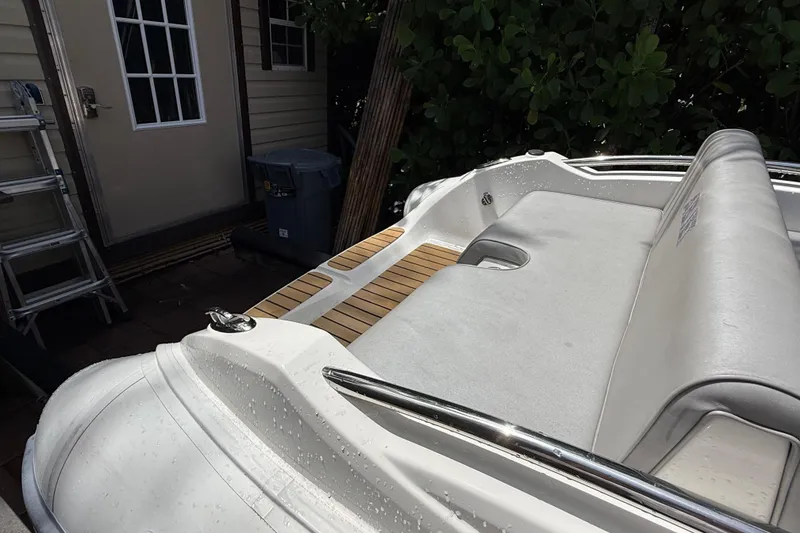 Slide: The Image of 2022 AB Inflatables ABJET 430XP boat with sleek seating and teak accents. - 7