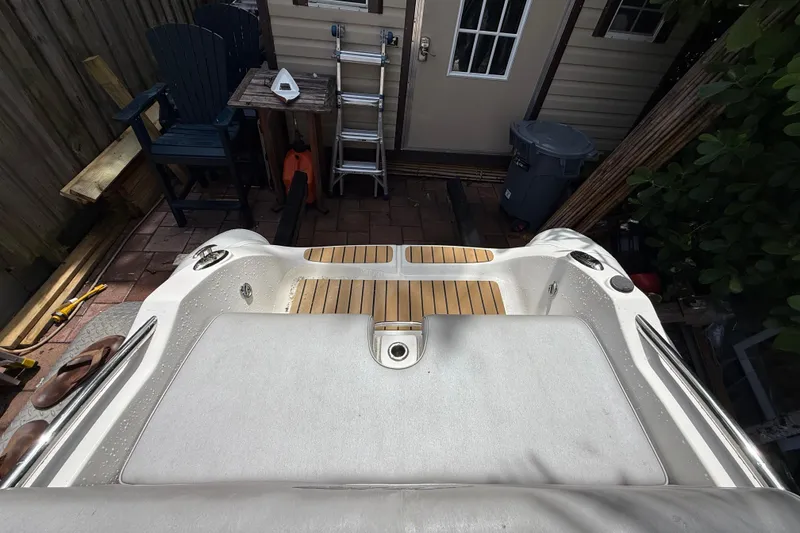 Slide: The Image of 2022 AB Inflatables ABJET 430XP boat interior with wooden deck and seating area. - 6