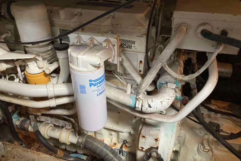 Slide: The Image of Engine compartment of a 2002 Silverton 39 Motor Yacht with Purolator oil filter. - 28