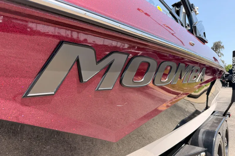 Slide: The Image of Red 2019 Moomba Makai boat with bold logo on trailer. - 3