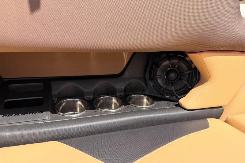Slide: The Image of 2019 Moomba Makai interior with cup holders and speaker detail. - 31
