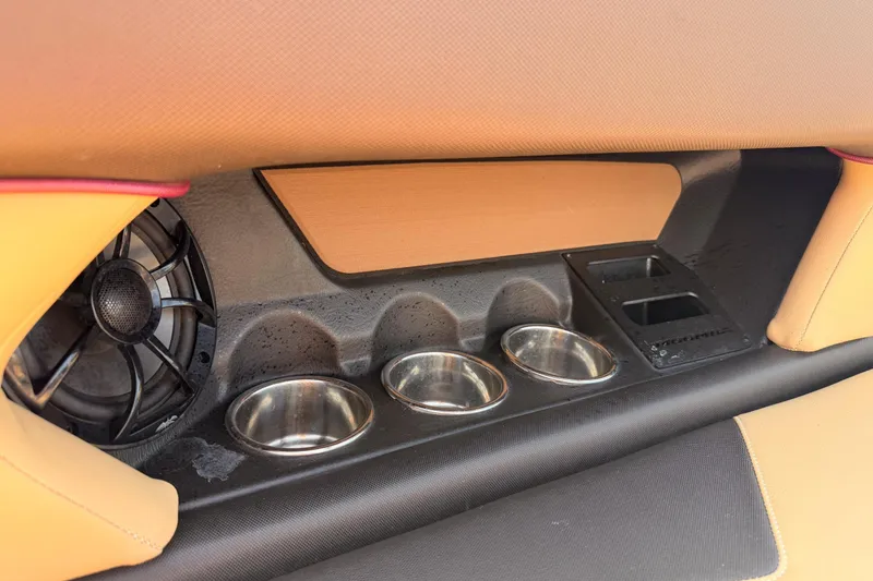 Slide: The Image of 2019 Moomba Makai interior with cup holders and speaker detail. - 30