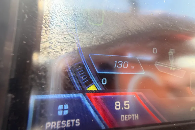 Slide: The Image of Close-up of 2019 Moomba Makai dashboard displaying 130 hours and 8.5 depth. - 17