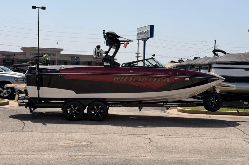 Slide: The Image of 2019 Moomba Makai boat on trailer in parking lot, side view. - 5