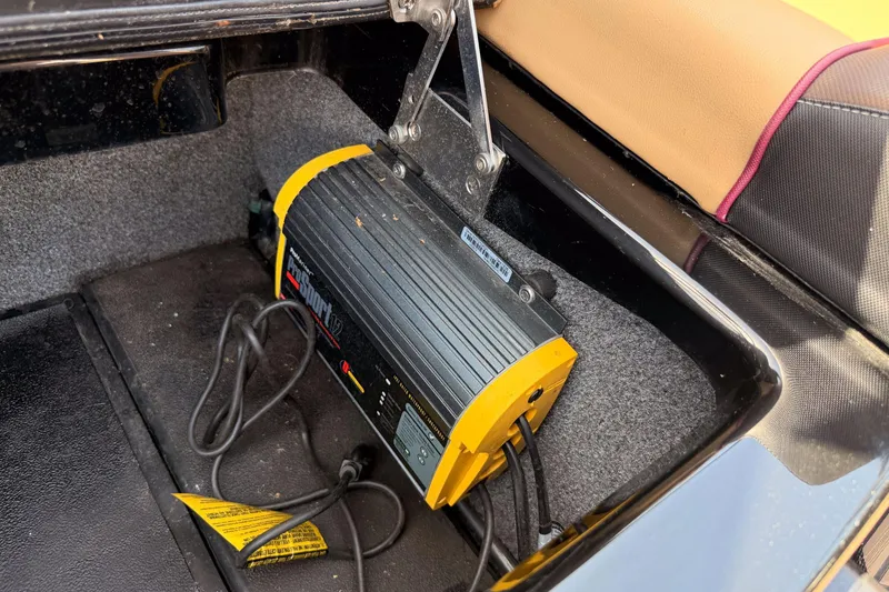 Slide: The Image of Battery charger installed in a 2019 Moomba Makai boat compartment. - 26