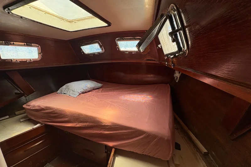 Slide: The Image of Cozy cabin interior of 1980 Gulfstar 50 CC Ketch with wooden finish and skylight. - 31