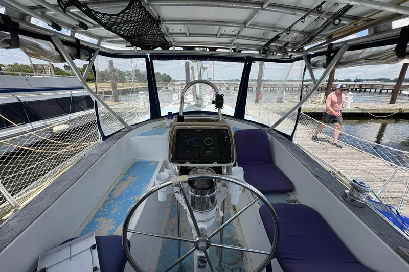 Slide: The Image of Cockpit view of 1980 Gulfstar 50 CC Ketch sailboat docked at marina. - 15