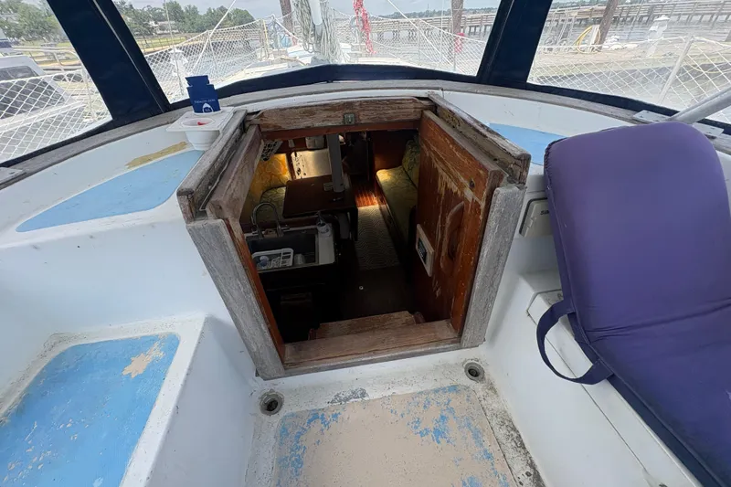 Slide: The Image of Cockpit view of 1980 Gulfstar 50 CC Ketch, showing cabin entrance and seating area. - 14