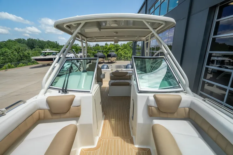 Slide: The Image of 2016 World Cat Glacier Bay Edition 2740 Dual Console boat with spacious seating and modern design. - 15