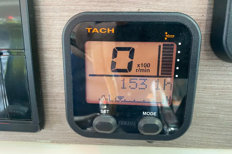 Slide: The Image of Tachometer display on 2016 World Cat Glacier Bay Edition 2740 Dual Console boat. - 48