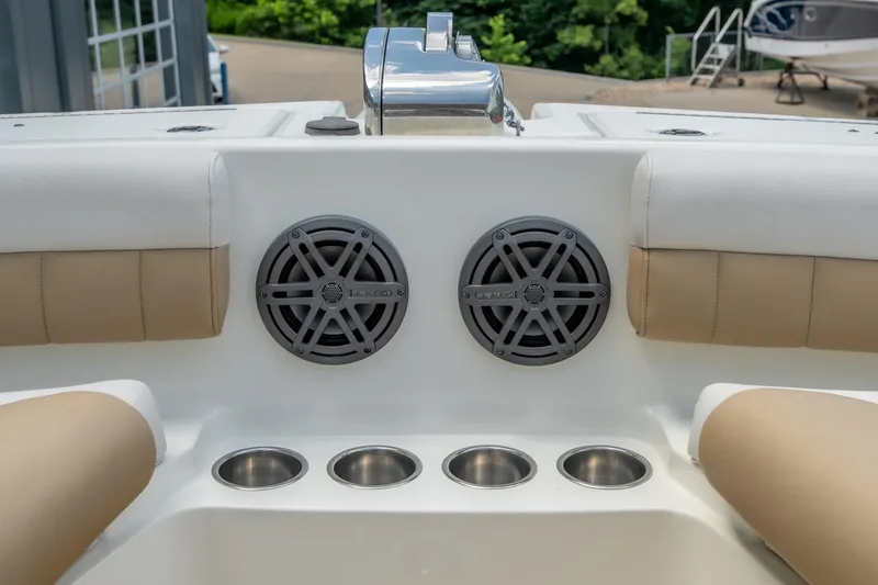 Slide: The Image of 2016 World Cat Glacier Bay Edition 2740 Dual Console boat speakers and cup holders. - 13