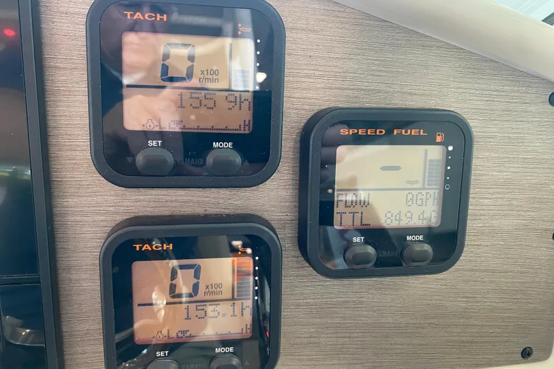Slide: The Image of Dashboard of 2016 World Cat Glacier Bay Edition 2740, showing tachometer and fuel gauges. - 46