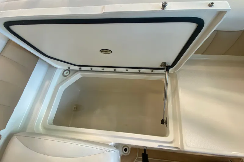 Slide: The Image of Open storage compartment on 2016 World Cat Glacier Bay Edition 2740 Dual Console boat. - 41