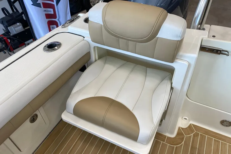 Slide: The Image of 2016 World Cat Glacier Bay Edition 2740 Dual Console boat seat, beige and white upholstery. - 37