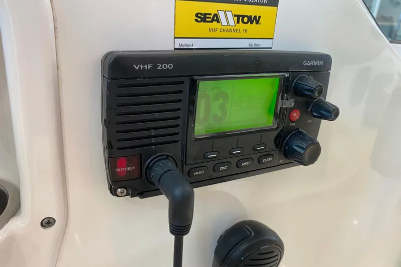 Slide: The Image of Garmin VHF 200 radio on 2016 World Cat Glacier Bay Edition 2740 Dual Console boat. - 49