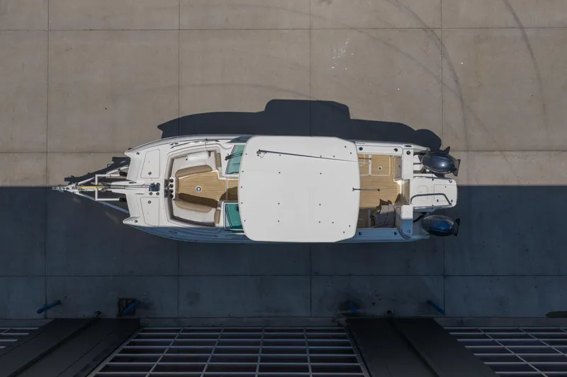 Slide: The Image of Overhead view of 2016 World Cat Glacier Bay Edition 2740 Dual Console boat. - 20