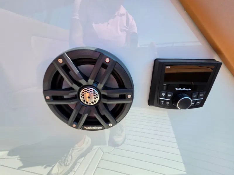 Slide: The Image of A speaker and control unit are mounted on a boat's wall. - 41