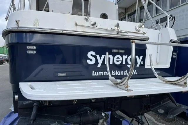 Slide: The Image of 2008 Ranger 2510 Bay Ranger boat named "Synergy" docked at Lummi Island, WA. - 8
