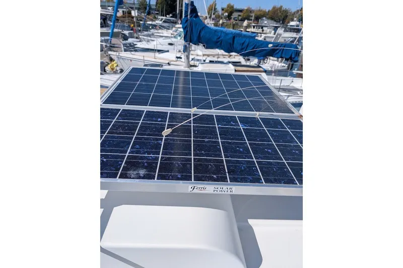 Slide: The Image of Solar panels on a 2008 Ranger 2510 Bay Ranger boat at a marina. - 20