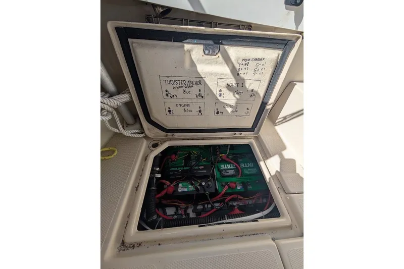 Slide: The Image of 2008 Ranger 2510 Bay Ranger battery compartment with wiring diagram and Interstate batteries. - 46